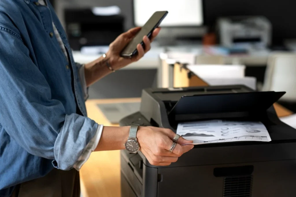 Man is checking copier Costs in Sanford