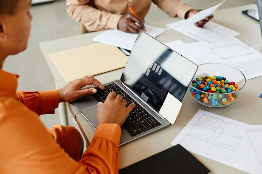 Best Project Management Tools for Students Working on Group Assignments 9 a person using a laptop