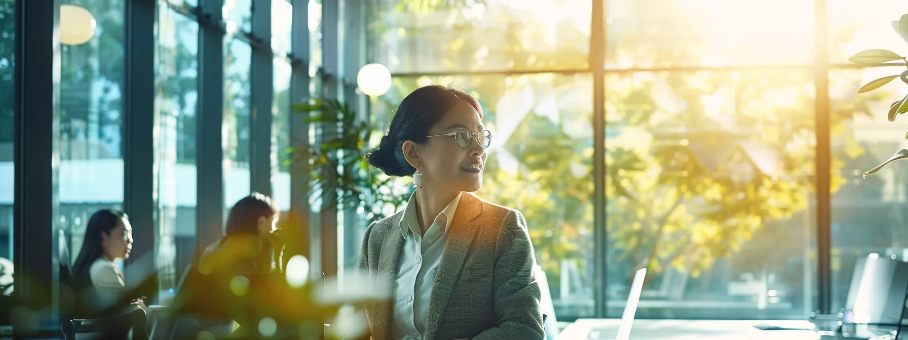 a dynamic, modern office environment showcases a confident chief information officer engaged in a strategic discussion with engineers, symbolizing the transformation of the cio role from it management to innovative business leadership, illuminated by natural light streaming through large windows.