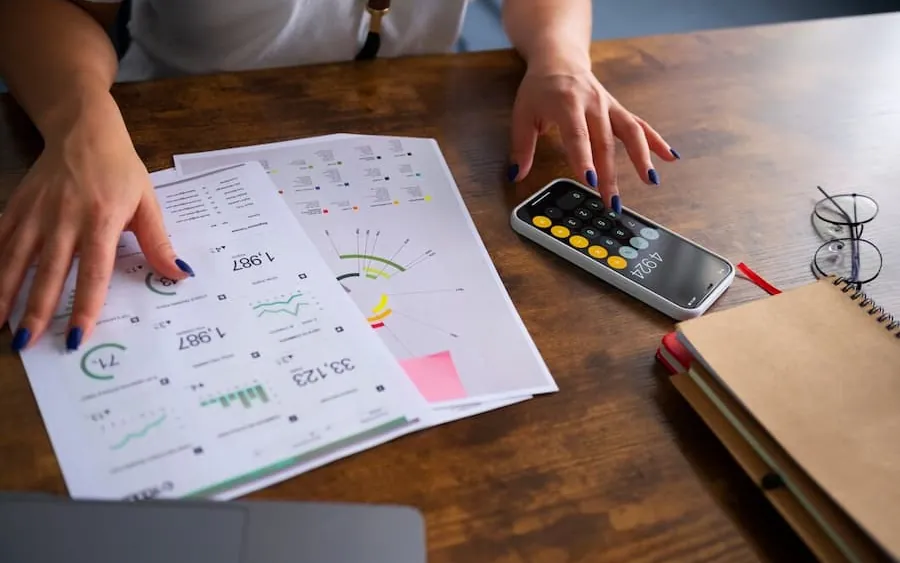 Planning documents and a budget on a desk