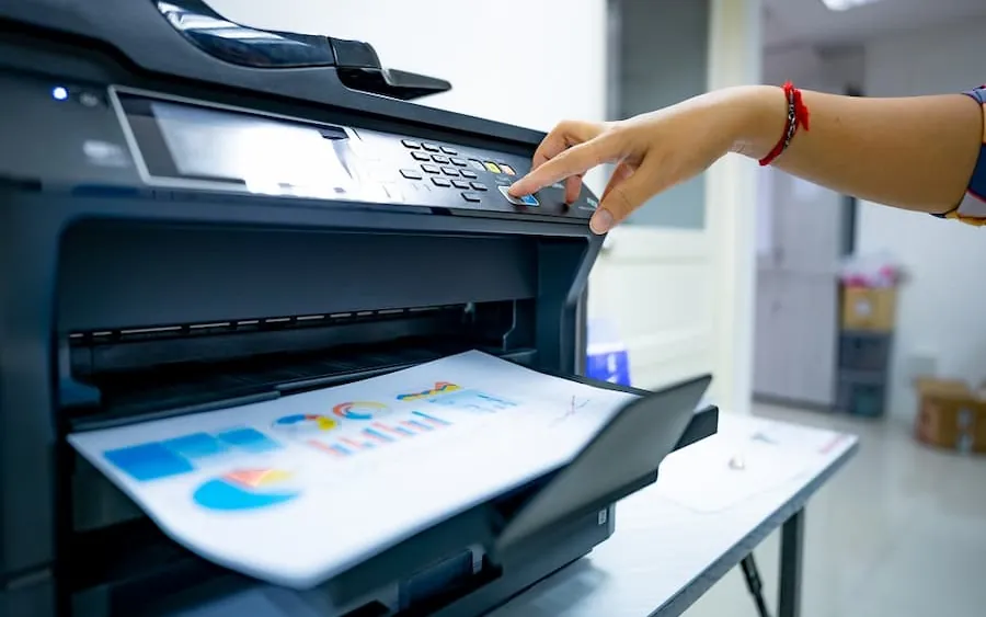 A color report coming out of a laser printer