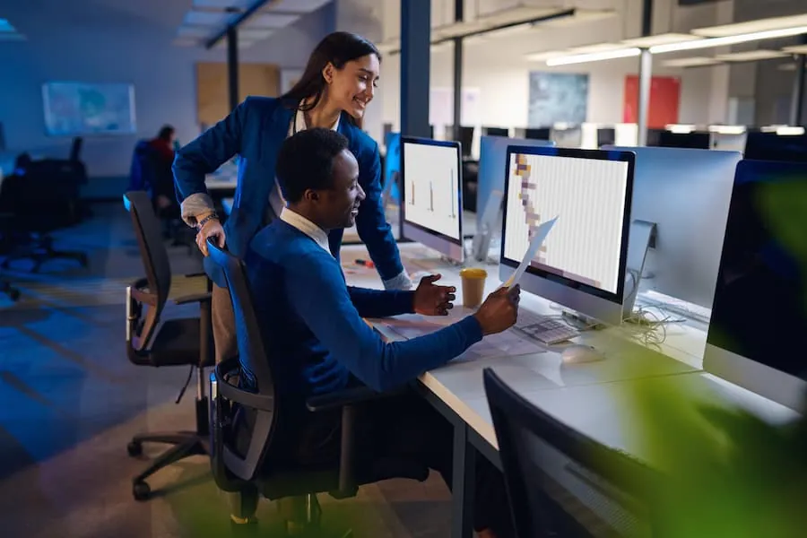 A small business team working together in a bright office