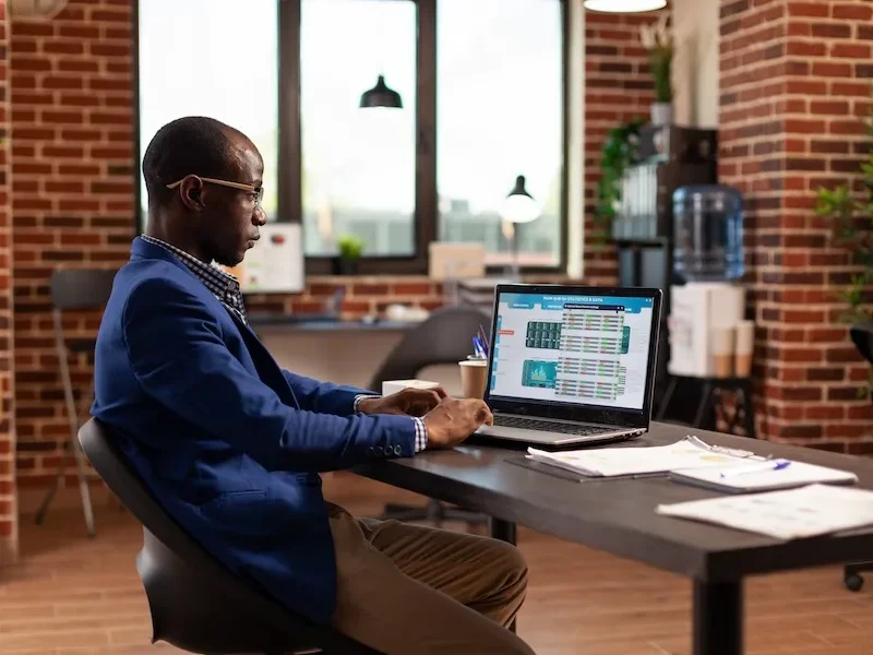 business_man_looking_data_chart