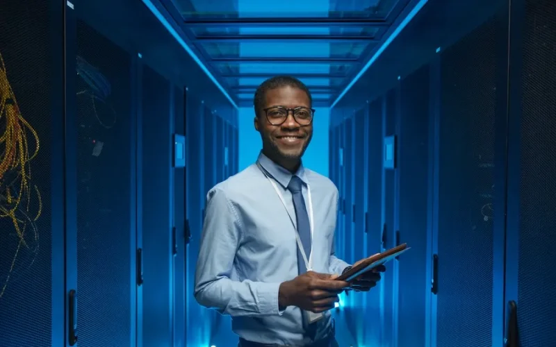 Smiling man data center